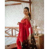 Red cotton printed saree with unstitched blouse, vibrant design on display