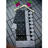 Black silk printed saree with unstitched blouse, 5.5mtr length on mannequin