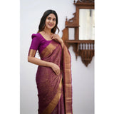 Women's wine silk printed saree with unstitched blouse, vibrant pattern on display