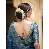 Teal blue silk printed saree with unstitched blouse, vibrant pattern for Indian women's fashion