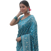 Sky blue silk printed saree with unstitched blouse, 5.5mtr length on mannequin for Indian women's fashion