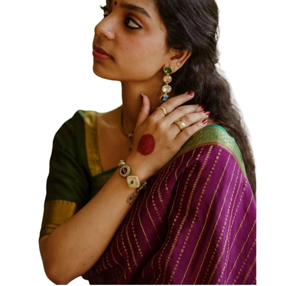 Women's wine silk printed saree with unstitched blouse, intricate design on display