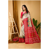 White soft Dola cotton kalamkari printed saree with unstitched blouse, traditional Indian attire on mannequin