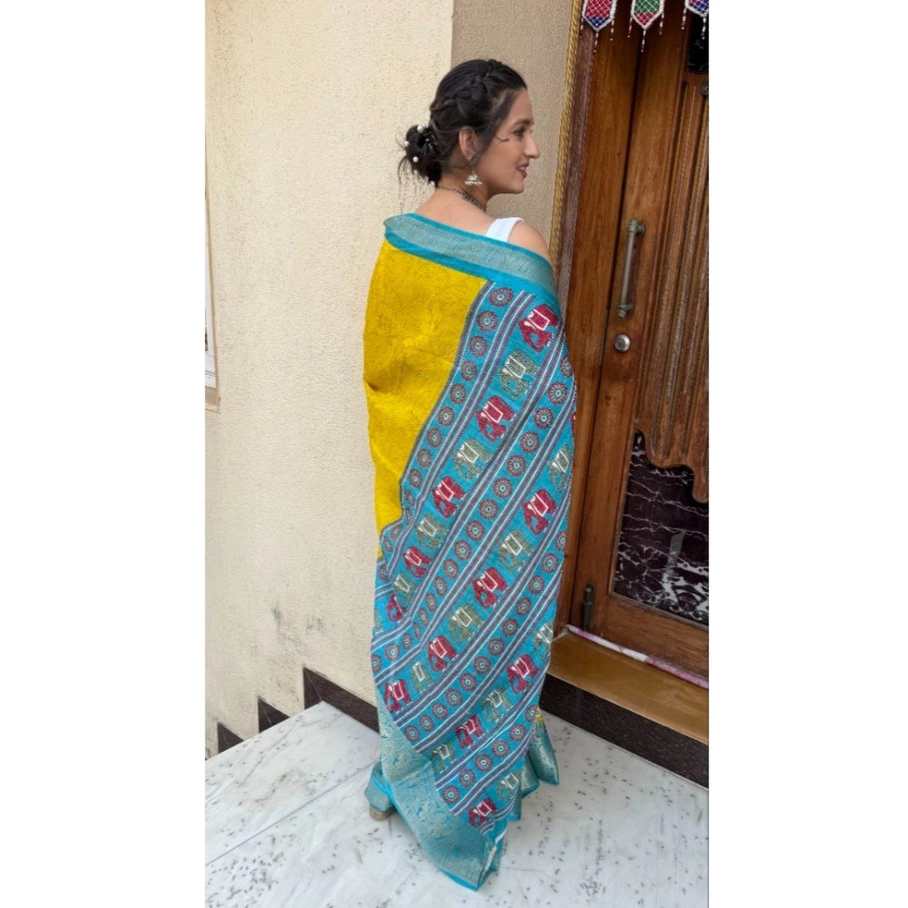 Mustard soft Dola cotton kalamkari printed saree with unstitched blouse, vibrant Indian ethnic wear on mannequin