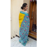 Mustard soft Dola cotton kalamkari printed saree with unstitched blouse, vibrant Indian ethnic wear on mannequin