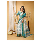 Soft cotton silk turquoise printed saree with unstitched blouse, vibrant Indian women's traditional wear on mannequin