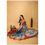 Teal blue handloom cotton kalamkari saree with unstitched blouse, vibrant print on flowing fabric