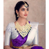 Purple soft lichi silk printed saree with unstitched blouse (5.5Mtr), elegant fashion accessory on display