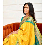 Soft yellow lichi silk printed saree with unstitched blouse (5.5mtr), luxurious Indian traditional wear on mannequin