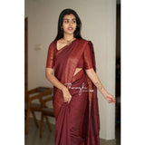 Maroon soft lichi silk saree with unstitched blouse (5.5mtr), elegant solid pattern on display