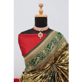 Gold Banarasi printed saree with unstitched blouse, intricate design on display rack