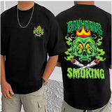 Black cotton blend men's casual printed round neck t-shirt with half sleeves, featuring vibrant artwork