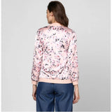 Light Pink Satin Floral 3/4th Sleeve Jacket for women with collar neck, hip length, floral pattern on display