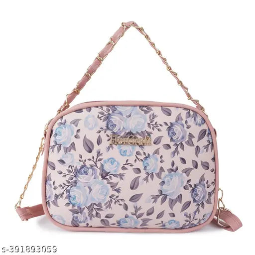 Printed net PU sling bag for women and girls with two compartments, featuring a floral design. Perfect accessory for on-the-go organization. Made in India