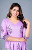 Purple rayon hand-printed women's kurti, vibrant floral design, ideal for everyday wear and travel
