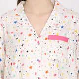 Women's star moon print rayon loungewear set - white pyjama and shirt with long sleeves, printed design on display rack