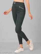 Solid green polyester pocket jeggings for women & girls, stylish fit and flattering length
