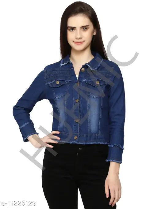 Distressed denim jacket, long sleeves, dyed/washed, vintage-inspired garment for casual wear on hanger