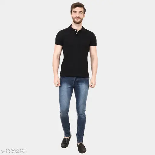 Stylish branded men's cotton blend jeans, dyed/washed. Close-up of blue denim jean with belt loops and front pocket detailing (size 28, waist 28in, length 40in, hip 32in)