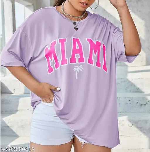 Oversized purple printed cotton t-shirt top by Veronica Elegant'S, perfect for women & girls. Trendy fashionwear for Instagram, Reels, and TikTok." (108 characters)