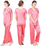 Pink silky satin pyjama set (free size), short-sleeved top and bottom in solid pattern, on hangar