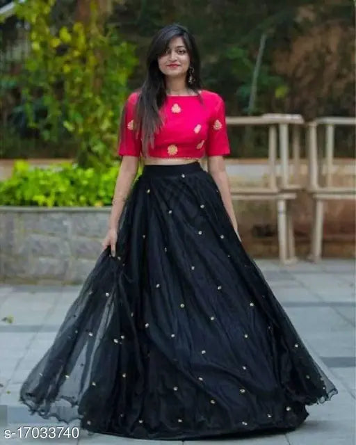 Black satin and net semi-stitched lehenga choli with embroidered patterns, latest Indian fashion wear for women