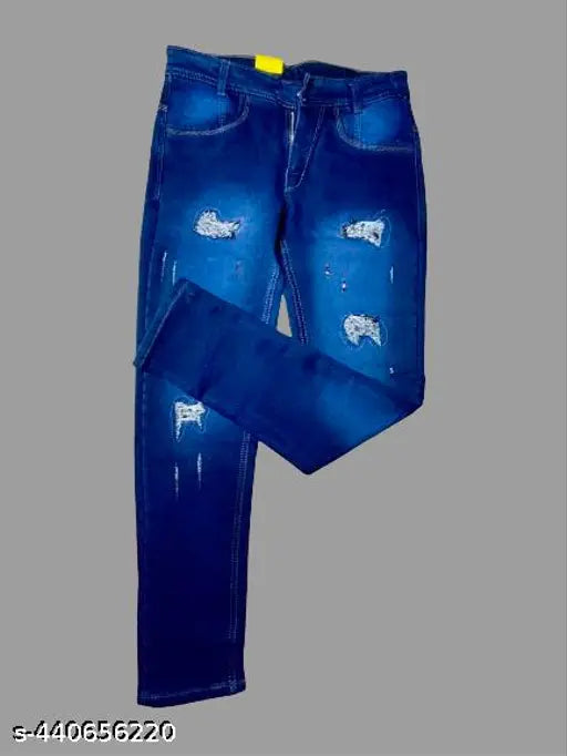Deep blue distress denim jeans with multiple distressed details, sleek fit, and brand tag on waistband