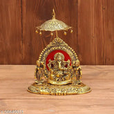 Golden metal Crafticia Lord Ganesh with Ridhi and Sidhi showpiece (16x14x20cm), symbolizing prosperity for pooja rooms or temples