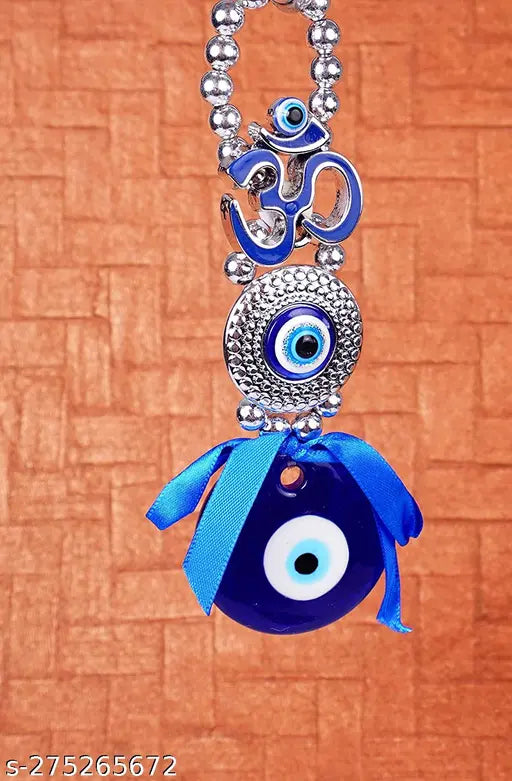 Blue glass Feng Shui Evil Eye OM Design amulet for protection, luck, and blessing at home, car, or office