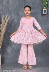 Embroidered rayon KIDAS SARARA SET, three-quarter sleeves kids clothing on display rack, diverse sizes from 3-4 to 14 years, Indian origin