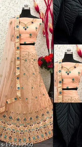 Peach net lehenga choli with exquisite embroidery work - perfect for weddings and special occasions, featuring free size options with 2.5m dupatta length, ideal for various events such as festivals, parties, bridal functions, and trips