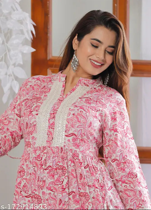 Trendy pink rayon floral kurti, three-quarter sleeve length, printed design for parties & festivals. Rayon women's kurti made in India