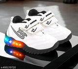 White and black canvas sneakers with LED lights for kids up to 7 years, embellished design and Velcro fastening