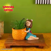 Yellow resin figurine of a cute thinking dreaming girl with basket showpiece, ideal for office, home, car, and desk decor, featuring an antique touch and suitable for birthdays, weddings, and Valentine's gifts. Hand-painted, with drainage hole and stopper on the bottom, measures 10.5 cm in length, height, and breadth