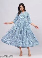 Rayon 8-pom pom flared gaun with printed combo, three-quarter sleeves. Available in S-XXXL sizes for women, made by Kurthub in India