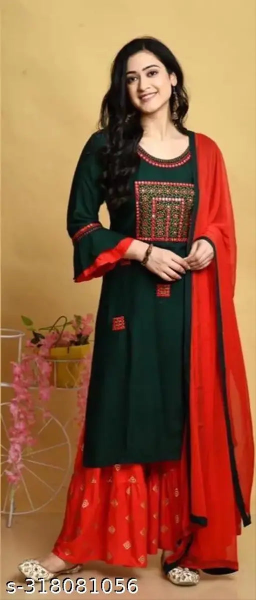 Latest rayon kurta sharara set with embroidery work, three-quarter sleeves, and matching dupatta and bottomwear. India origin