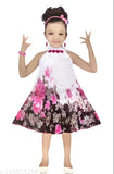 Stylish cotton blend sleeveless printed dress for girls, vibrant pattern on a young model (India)