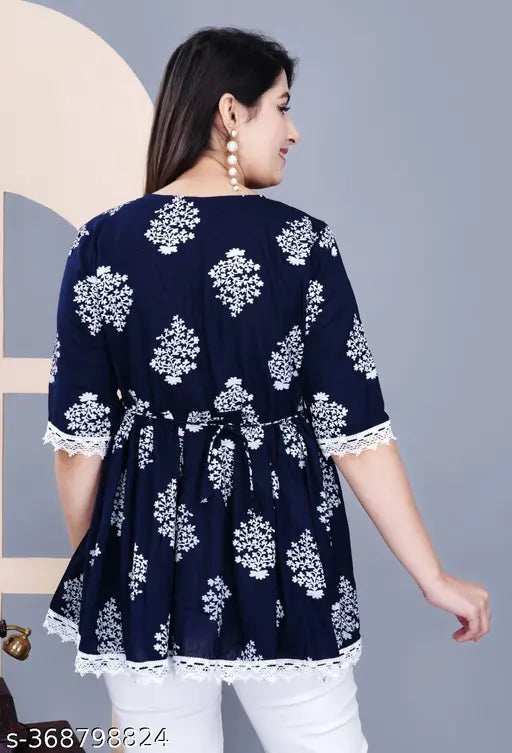 Rayon printed net three-quarter sleeve top, comfortable for party wear by NEW WOMAN