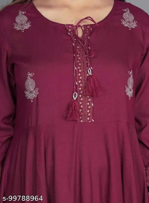 Purple rayon flared kurti with tussles, three-quarter sleeves, solid design. M (38in), L (40in), XL (42in), XXL (44in). Indian ethnic wear fashion