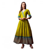 Green cotton blend printed Anarkali gown with v-neck and 3/4th sleeves, ideal for formal events