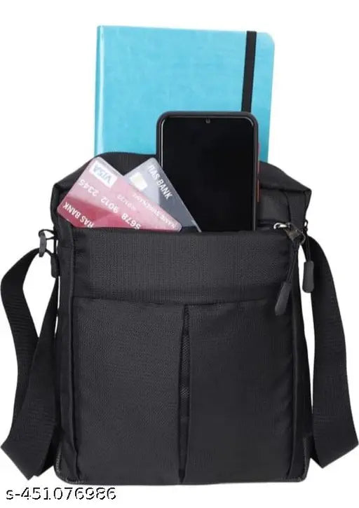 Stylish polyester men's sling bag, compact and lightweight, ideal for college, office, travel, or daily use. Black unisex design with water-resistant material