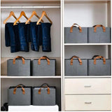 Multicolor foldable cloth organizer box with handle. Ideal for storing clothes, toys, books, accessories, and household essentials. Strong side handles allow easy lifting, moving, and placement. Suitable for wardrobes, shelves, kids' rooms, closets, and storage cabinets. Handle with care for decorative or personal use only