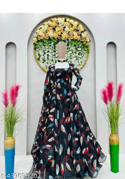 Black georgette printed gown with dupatta, long sleeves, elegant Indian evening wear on mannequin