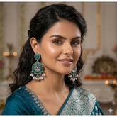 Multi-colored zinc alloy gold-plated chandbali earrings on display, avoid contact with water, perfume, and harsh chemicals