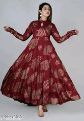 Gold printed cotton anarkali kurta with long sleeves, intricate design on display. Available in sizes M (38in bust, 52in length), L (40in bust, 52in length), XL (42in bust, 52in length), XXL (44in bust, 52in length). Indian ethnic wear