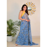 { "alt_text": "Blue georgette printed saree with unstitched blouse, 5.5m, ethnic wear, Indian fashion" }