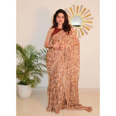 { "alt_text": "Brown georgette printed saree with unstitched blouse, 5.5 meter ethnic wear, Indian fashion" }