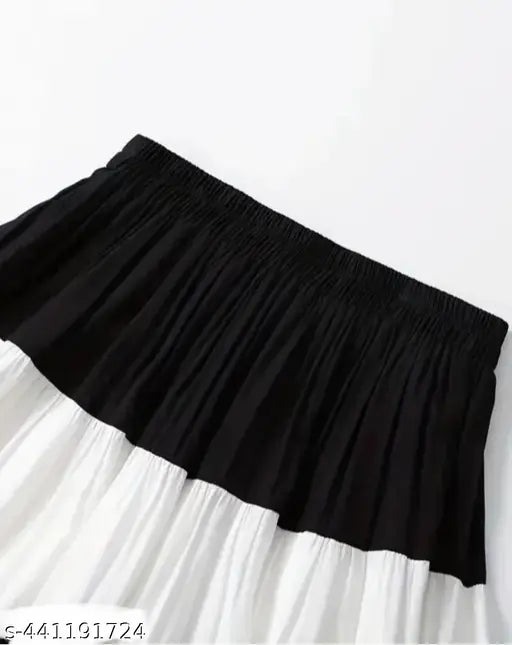 Multi-color rayon, colorblocked net, long skirt for light occasions. Stylish, free size, comfortable, ethnic look. Variety of sizes available from waist 24 to 42 and free size. Made in India