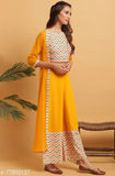 Women's poly crepe printed crop top kurti with palazzos - vibrant, three-quarter sleeve Indian fashion set on mannequin