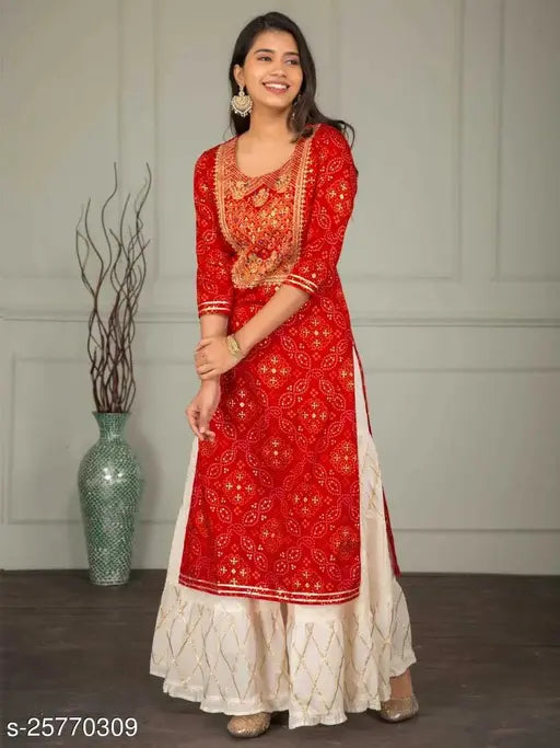 Rayon embroidered Myra refined women's kurta set with sharara bottomwear, printed net design, three-quarter sleeves - Indian fashion